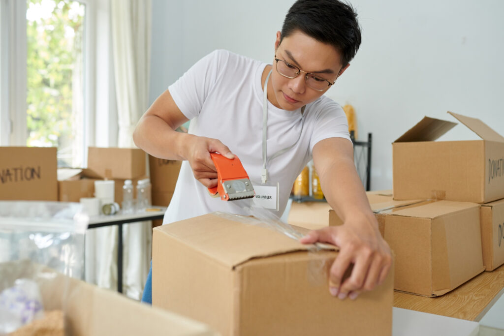 man packing for a move with proper techniques