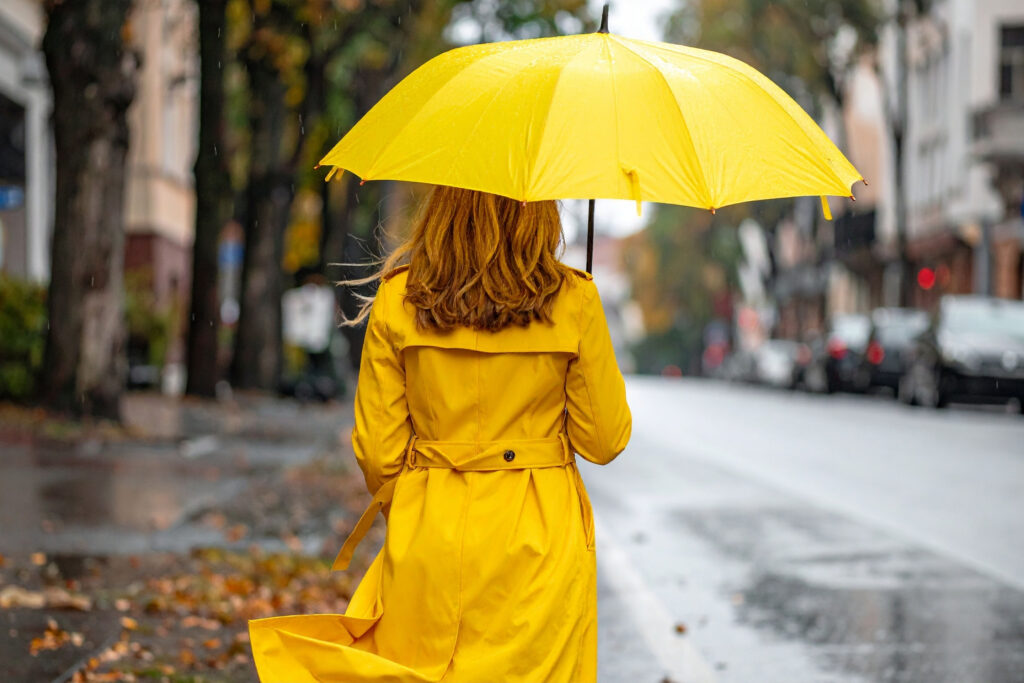 raincoat and umbrellas to protect from rainy season in singapore 